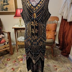 Elegant Beaded Black and Gold Reproduction 1920's Flapper Dress
